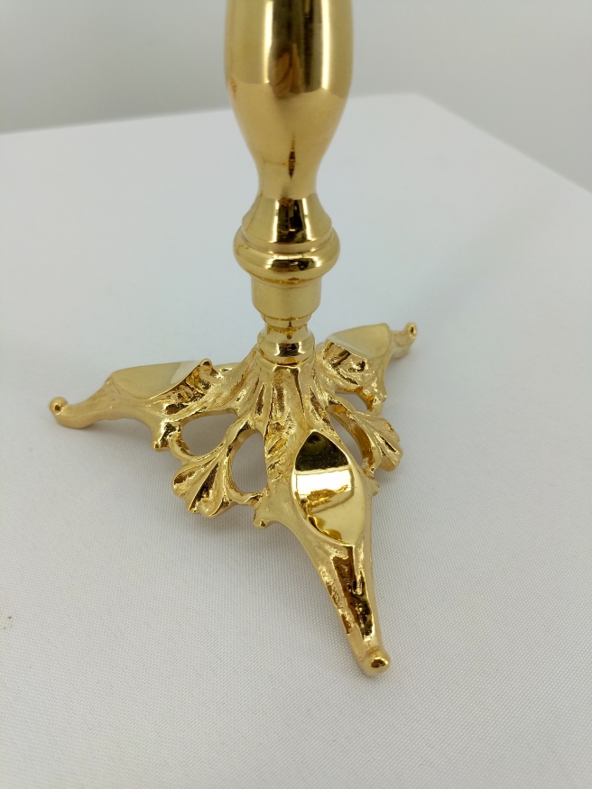 Dikiri and Trikiri (brass) height 41cm width 14.5cm