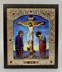 Icons in a riza on a wooden panel